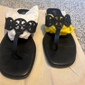 Tory Burch Black Sandals with Decorative Strap
Lightly worn